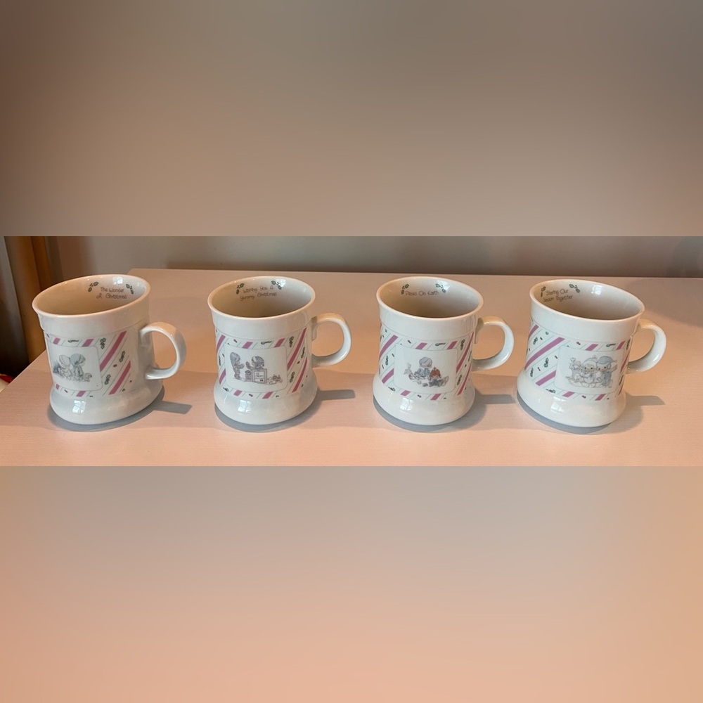 1989 Enesco Precious Moments "Pieces On Earth" Christmas mugs. Complete set